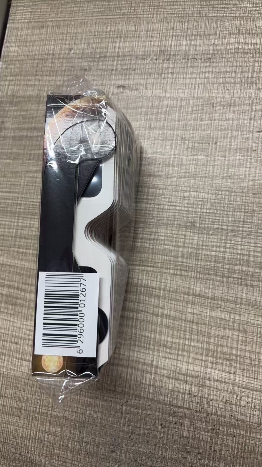 Solar eclipse glasses back view - safety info